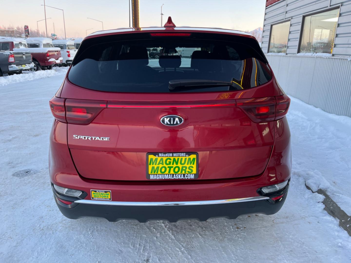 2021 Red /black Kia Sportage LX AWD (KNDPMCAC8M7) with an 2.4L V6 DOHC 24V engine, 6A transmission, located at 1960 Industrial Drive, Wasilla, 99654, (907) 274-2277, 61.573475, -149.400146 - Photo#4